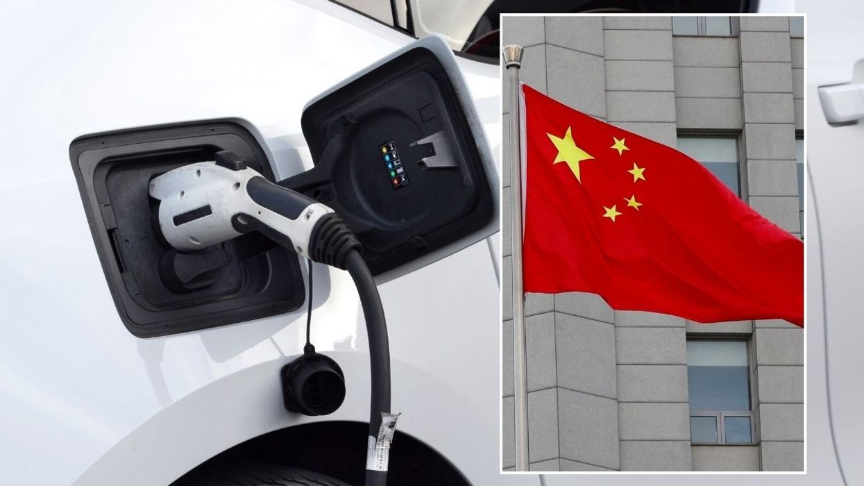 Electric car charging and a Chinese flag