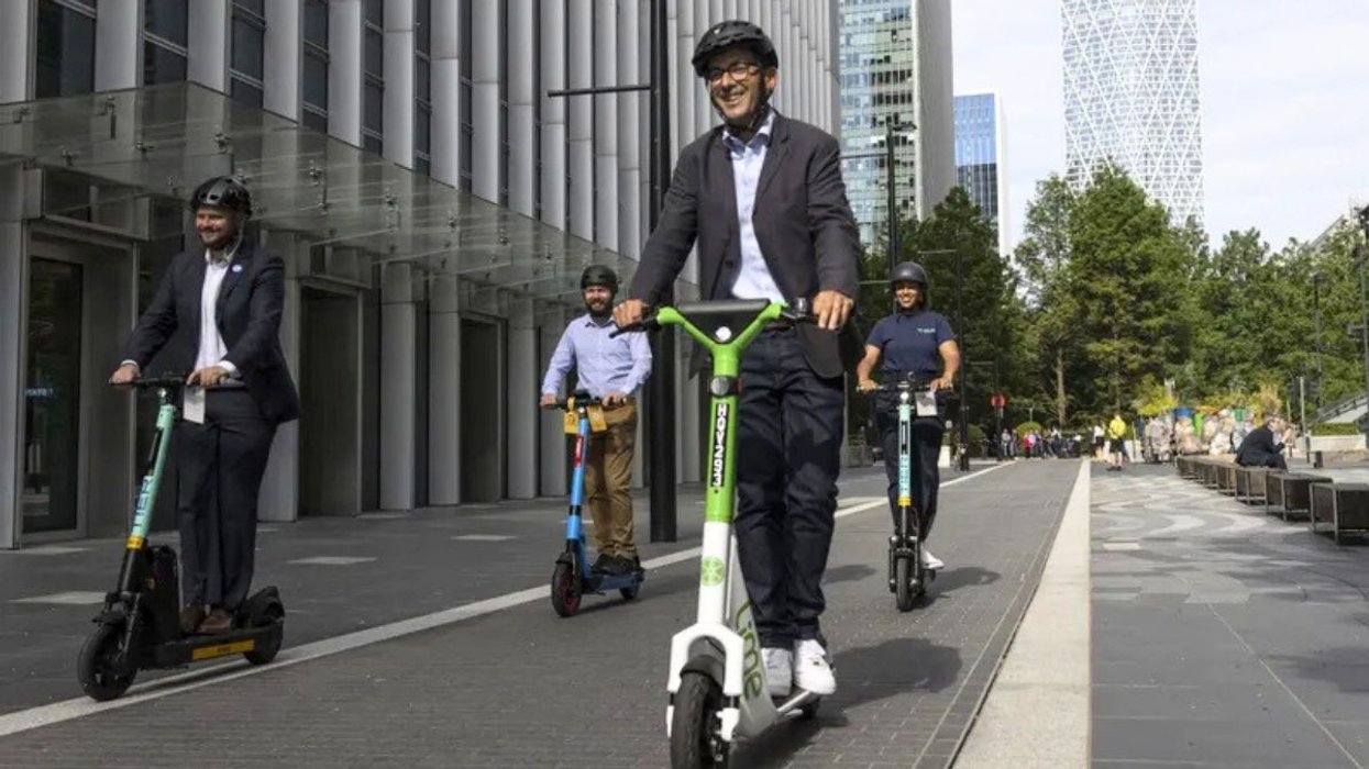 Electric scooters riding through London