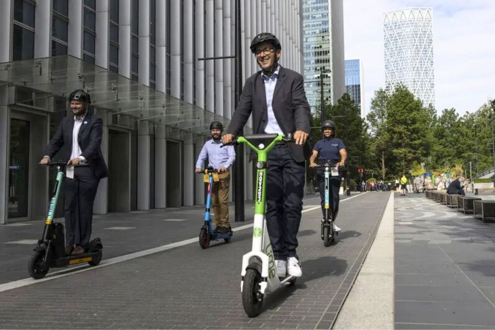 Electric scooters riding through London