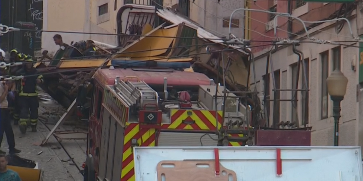 NextImg:At least three dead and 20 injured after tourist funicular crashes in Lisbon as emergency services rush to the scene