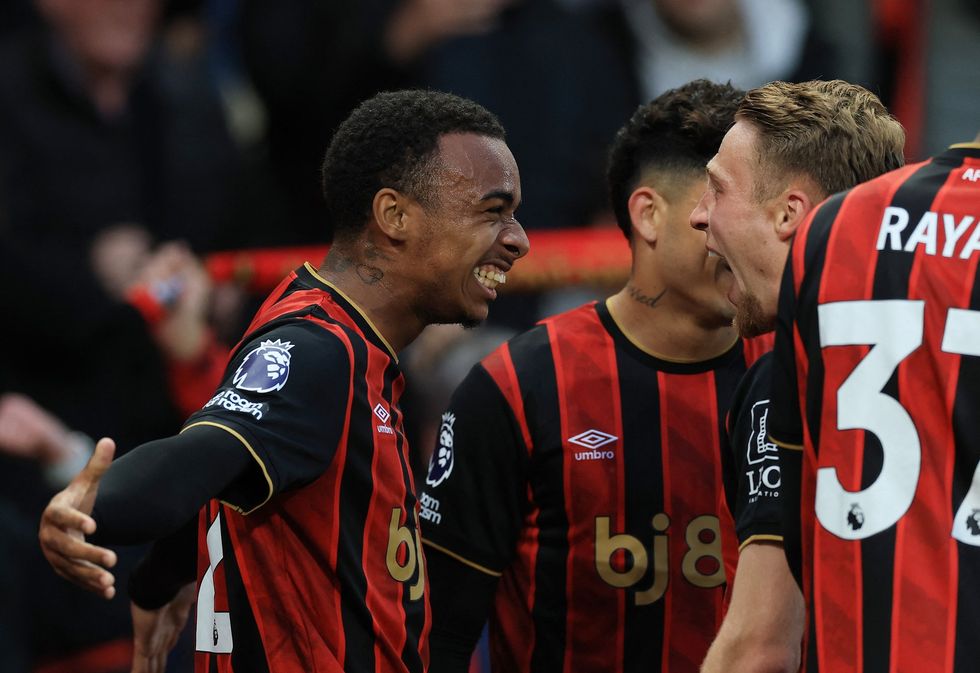 Eli Junior Kroupi scored the all-important goal that handed Arsenal the title and Bournemouth a shot at Champions League football