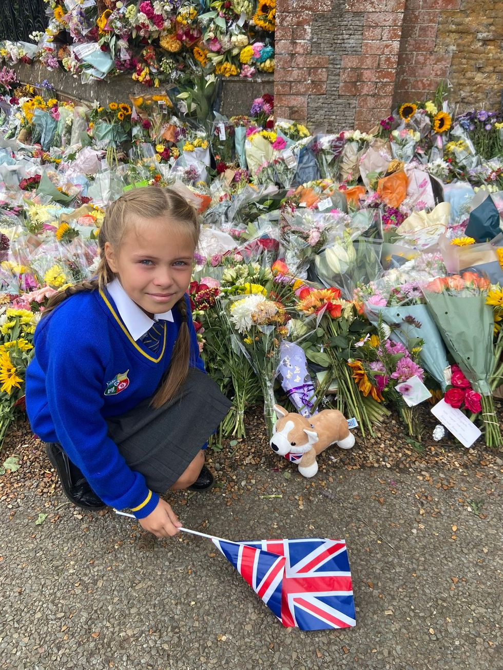 Elizabeth Sulkovska posing with the corgi toy