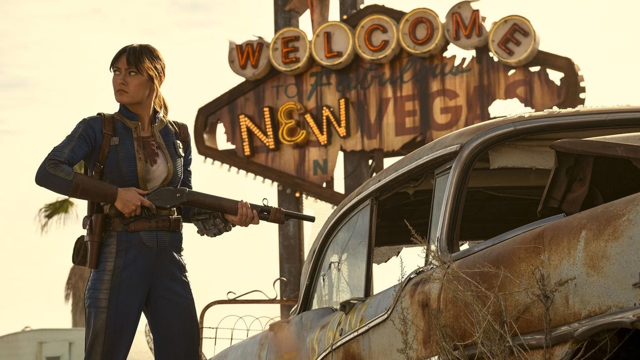 Ella Purnell pictured outside the Welcome To New Vegas sign from Fallout season 2