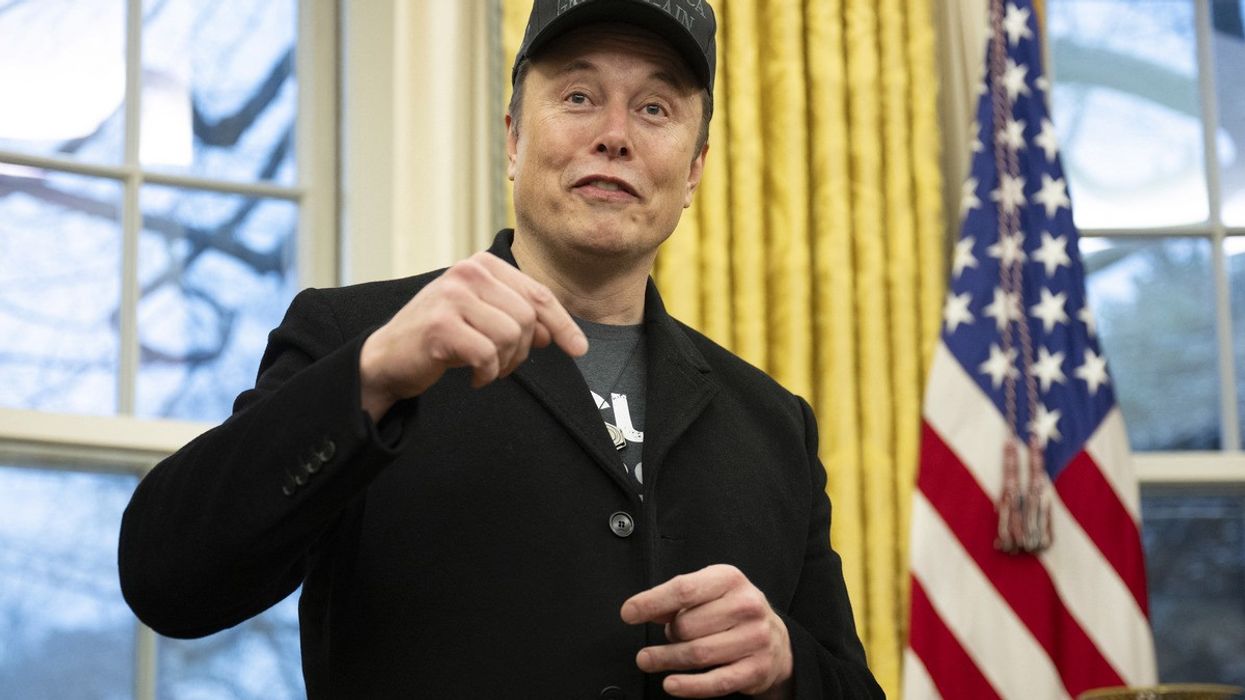 Elon Musk speaks in the Oval Office of the White House in Washington, DC