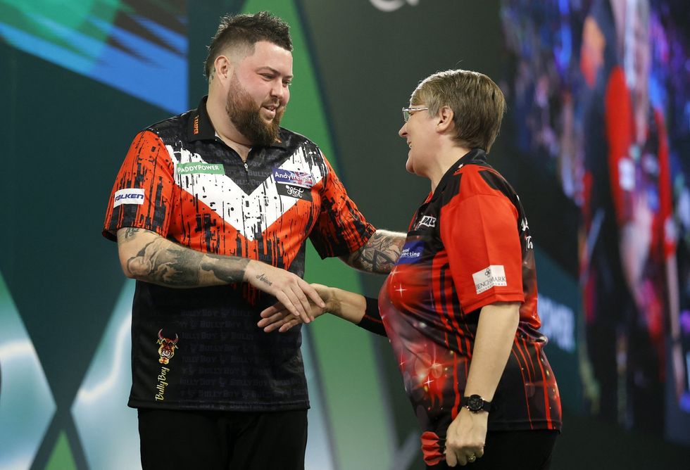 Elsewhere, Michael Smith beat Women's World Matchplay winner Lisa Ashton 3-0
