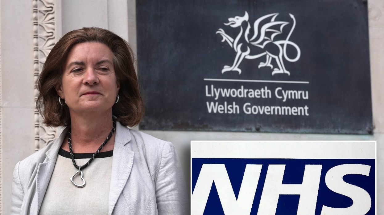 Eluned Morgan and NHS sign