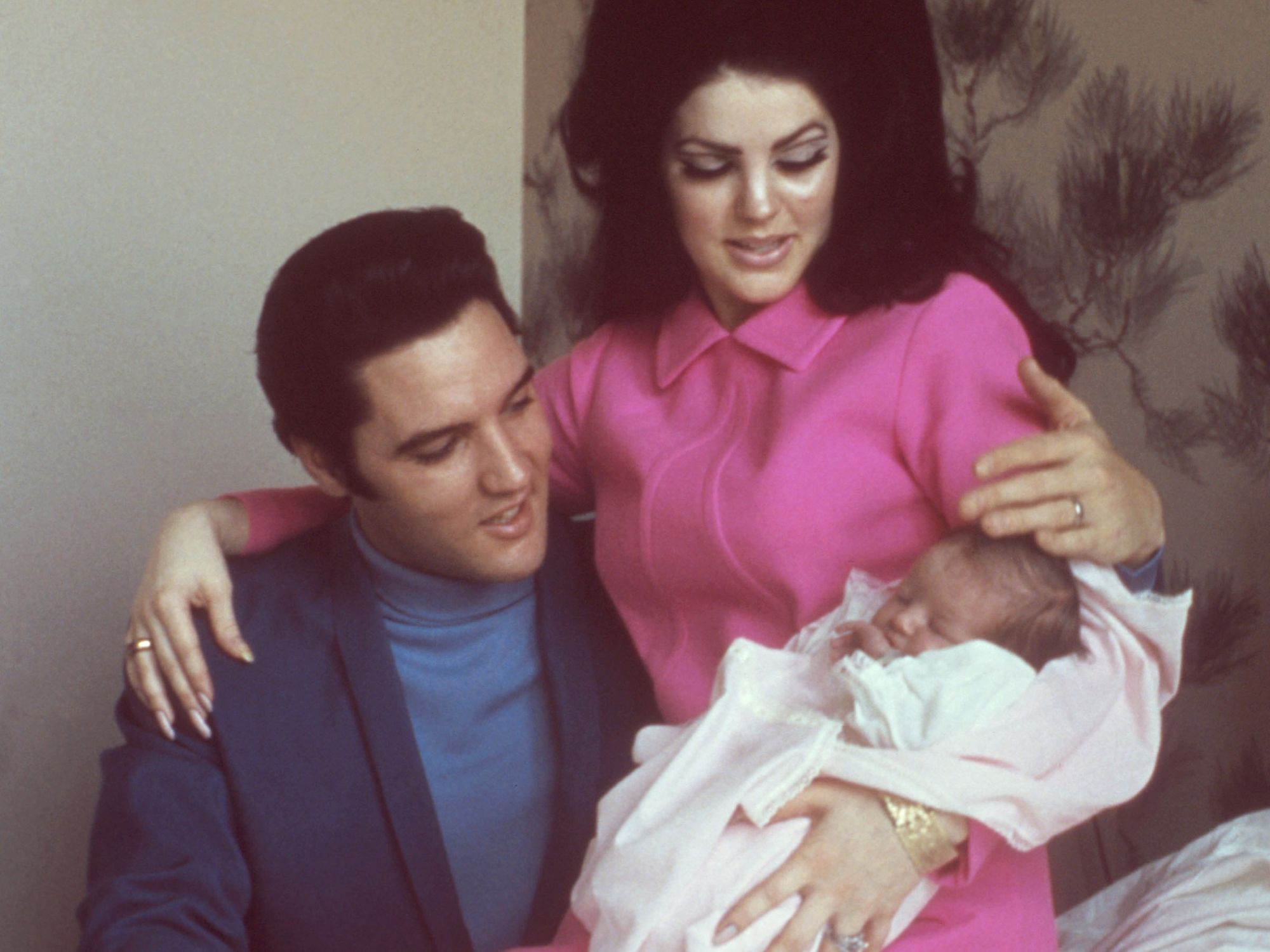 Elvis and Priscilla with baby Lisa Marie