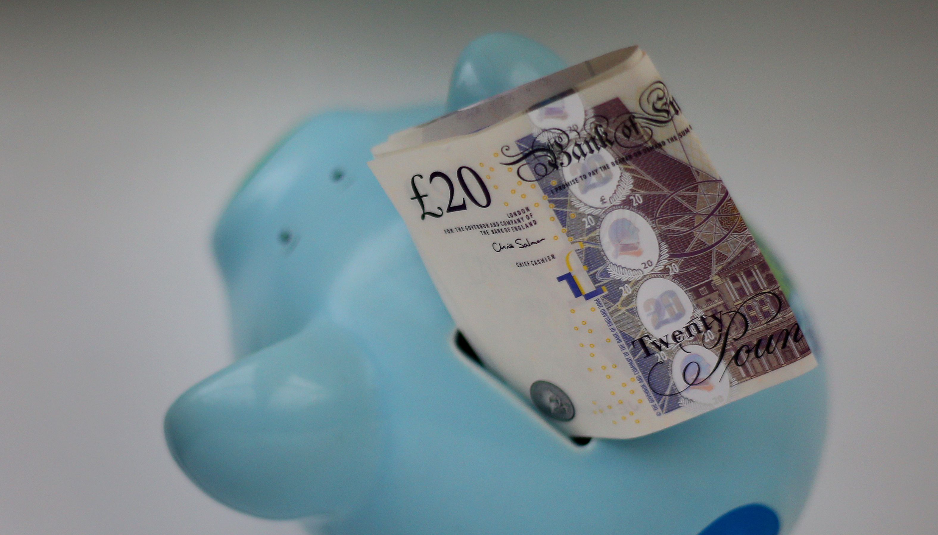 EMBARGOED TO 0001 MONDAY JANUARY 2 File photo dated 06/01/15 of money in a piggy bank. More than a third of UK adults would find it difficult or be unable to cover a 20 increase to their monthly outgoings, research suggests. Issue date: Monday January 2, 2023.