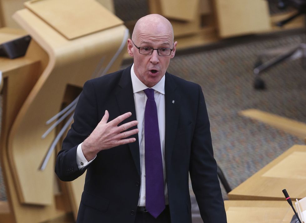 EMBARGOED TO 0001 SATURDAY NOVEMBER 27 File photo dated 05/10/21 of Deputy First Minister John Swinney who will tell the SNP conference to %22stand up and be counted before it's too late%22 to defend devolution. Mr Swinney is expected to tell members that the Conservative Government wants %22unfettered Westminster control on Scotland%22 and is using Brexit to undermine devolution.