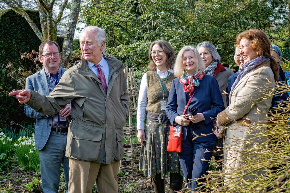 EMBARGOED TO 0001 SUNDAY APRIL 3 Undated handout photo issued by The Prince's Foundation of the Prince of Wales with tour guides in the gardens of his home in Highgrove, Wiltshire. The prince has welcomed more than 60 garden tour guides back to the estate, explaining changes made, outlining his vision for the following year, and highlighting his favourite flowers and trees and sharing the reasons for their inclusion, ahead of the 2022 Highgrove Gardens tour season which begins on Monday. Issue date: Sunday April 3, 2022.