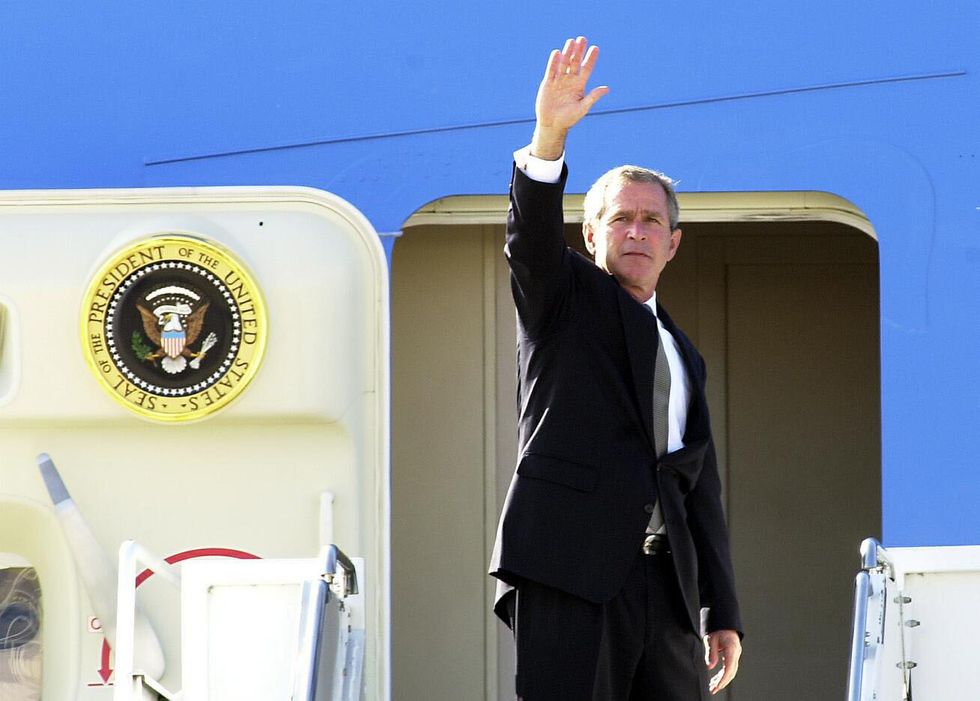 EMBARGOED TO 0001 THURSDAY DECEMBER 30 File photo dated 20/07/01 of then US President Bush, departing from Brize Norton, Oxfordshire, on Air Force One to fly to the G8 Summit in Genoa, Italy. According to newly released official papers George W Bush admitted he knew little about international affairs at his first meeting with Britain's ambassador to the US, Sir Christopher Meyer, who said the future US president's world view was limited to 'Texan and Mexican horizons'. Issue date: Thursday December 30, 2021.