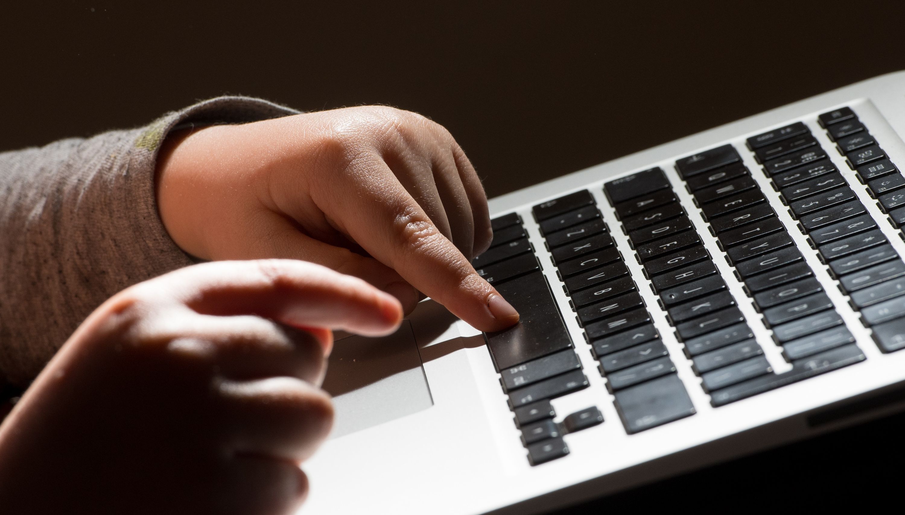 EMBARGOED TO 0001 TUESDAY NOVEMBER 29 File photo dated 26/05/22 of a child using a laptop computer. More than 1.6 million social media accounts owned by children are falsely registered with an adult age, a survey by the advertising regulator suggests. Some 93% of young people aged 11 to 17 say they have an account with Facebook, Instagram, Snapchat, TikTok, Twitch, Twitter or YouTube, with a quarter (24%) misreporting their age when doing so, the Advertising Standards Authority (ASA) found. Issue date: Tuesday November 29, 2022.
