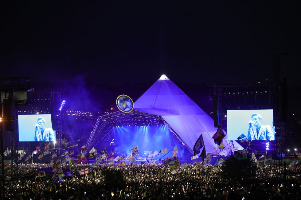 EMBARGOED TO 0001 TUESDAY SEPTEMBER 28 File photo dated 29/06/19 of The Killers playing the Pyramid Stage at Glastonbury Festival at Worthy Farm in Somerset. Environmentally damaging levels of illicit drugs have been found in the river running through the Glastonbury Festival site, scientists said. Issue date: Tuesday September 28, 2021.