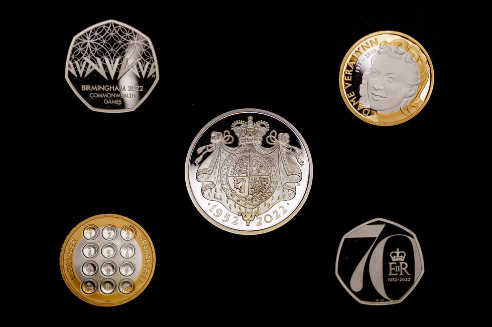 EMBARGOED TO 0001 WEDNESDAY DECEMBER 28 A Birmingham 2022 Commonwealth Games 50p coin (top left), a Life and Legacy of Dame Vera Lynn 2 coin (top right), a Platinum Jubilee of Her Majesty the Queen 5 coin (centre), a Life and Legacy of Alexander Graham Bell 2 coin (bottom left) and a Platinum Jubilee of Her Majesty the Queen 50p coin (bottom right), part of the release of five new Royal Mint coin designs for 2022, celebrating key events and anniversaries throughout the year, including a 50p and a 5 crown in celebration of Her Majesty the Queen's Platinum Jubilee. Each of the coins features a new and unique design by a commissioned artist and the obverse portrait of Her Majesty the Queen, designed by Jody Clark. Issue date: Wednesday December 28, 2021.
