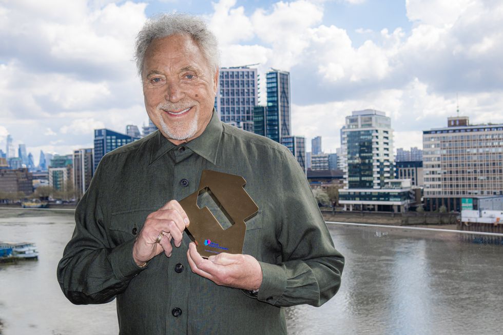 Embargoed to 1800 Friday April 30 Undated handout photo issued by the Official Charts Company of Sir Tom Jones with his Official Number 1 Album Award from the Official Charts Company for Surrounded By Time. Issue date: Friday April 30, 2021.