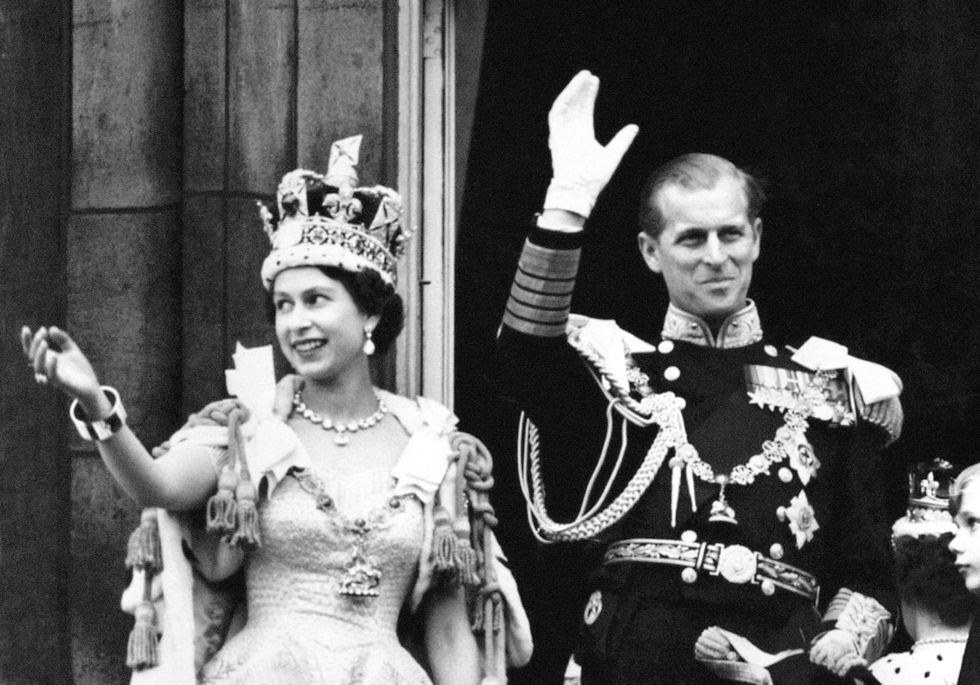 EMBARGOED TO 2200 SATURDAY FEBRUARY 5 File photo dated 02/06/53 of Queen Elizabeth II and the Duke of Edinburgh waving from the balcony after Her Majesty's Coronation. The Queen has used her Platinum Jubilee message to the nation to back the Duchess of Cornwall as Queen Camilla, shaping the future of the monarchy on her historic milestone. Issue date: Saturday February 5, 2022.