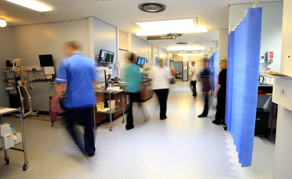 EMBARGOED TO 2200 TUESDAY DECEMBER 20 File photo dated 03/10/14 of staff on a NHS hospital ward, as nurses will announce post-Christmas strikes by the end of the week unless the Government agrees a deal on pay, a union chief has said.