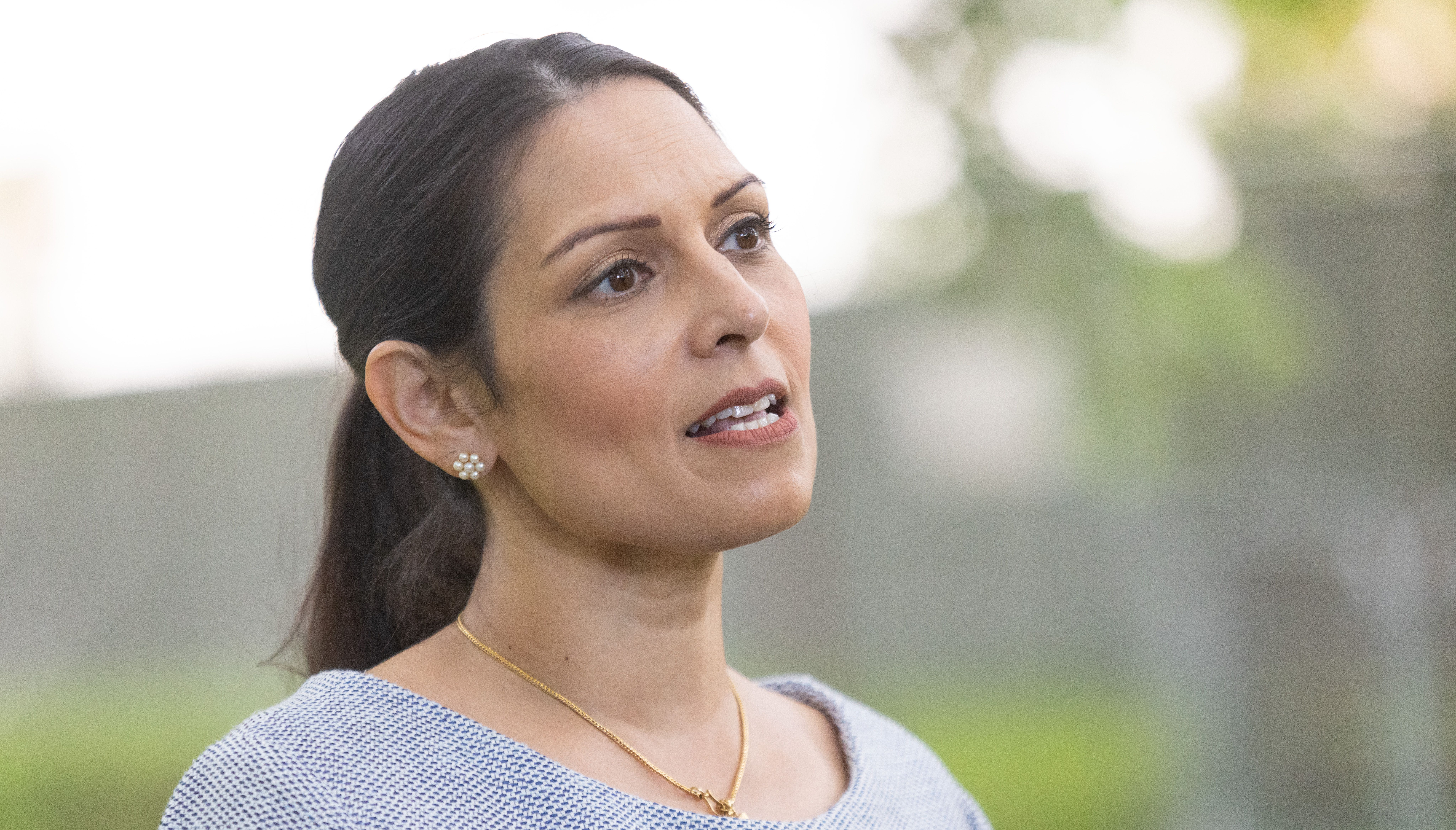 EMBARGOED TO 2200 WEDNESDAY JUNE 1 Home Secretary Priti Patel, talking to the media in Green Park, central London. After a tour of the security procedures in place around Buckingham Palace ahead of the Queen's Platinum Jubilee.