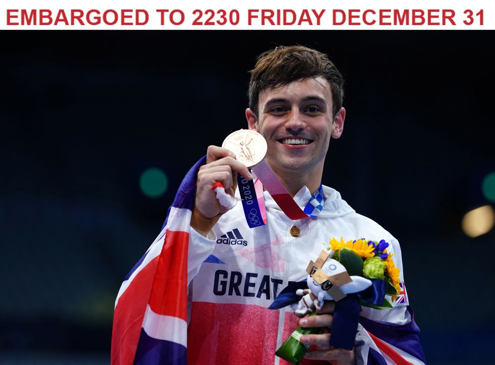 EMBARGOED TO 2230 FRIDAY DECEMBER 31 File photo dated 07/08/21 of Tom Daley who has been made an Officer of the Order of the British Empire (OBE) for services to Diving, to LGBTQ+ Rights and Charity in the New Year honours list. Issue date: Friday December 31, 2021.