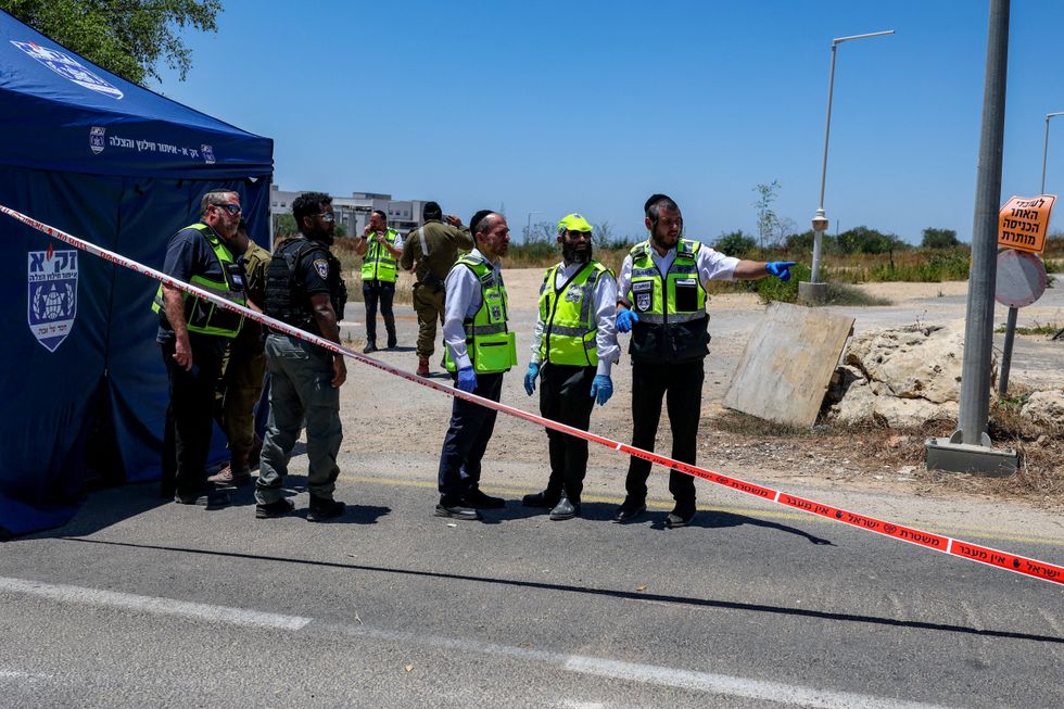 Emergency responders on the scene of a central Israel shooting