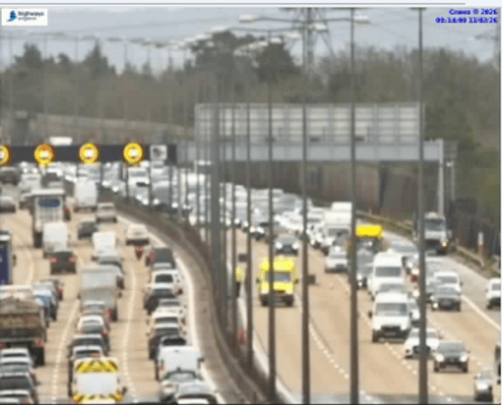 Emergency services are shown managing the collision between Junctions 10 and 11