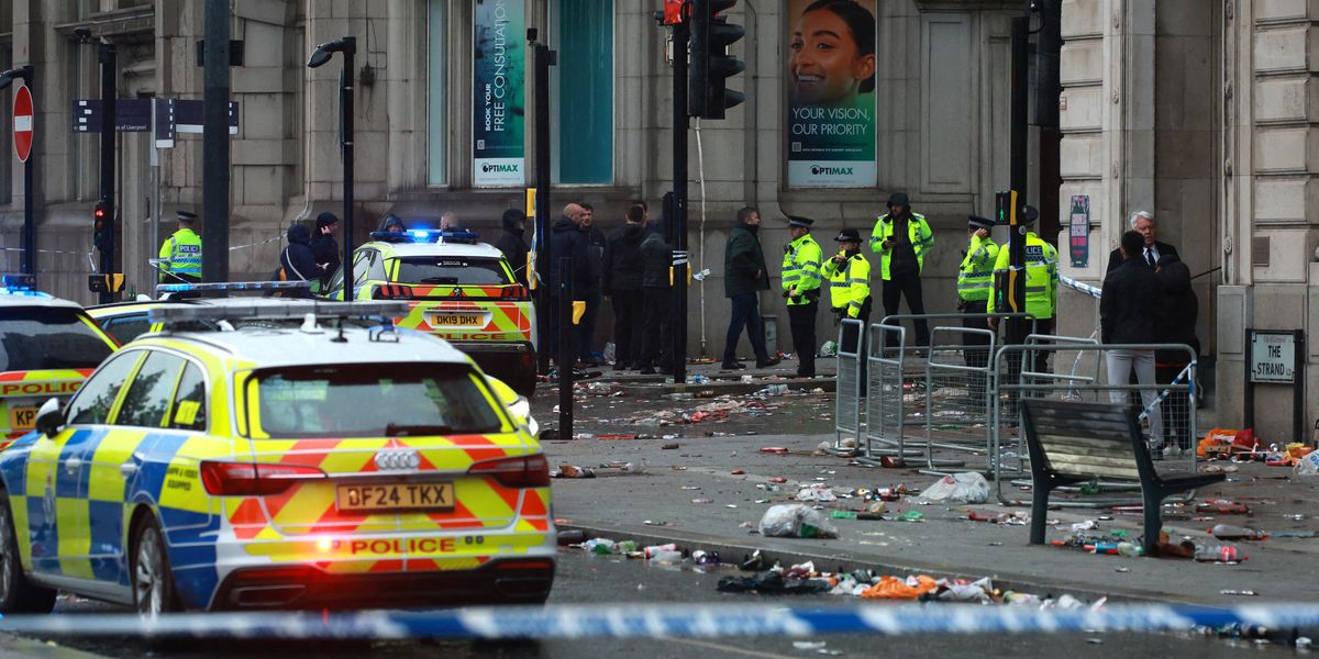 NextImg:Liverpool parade: British man arrested after car ploughs into crowd during Liverpool victory parade