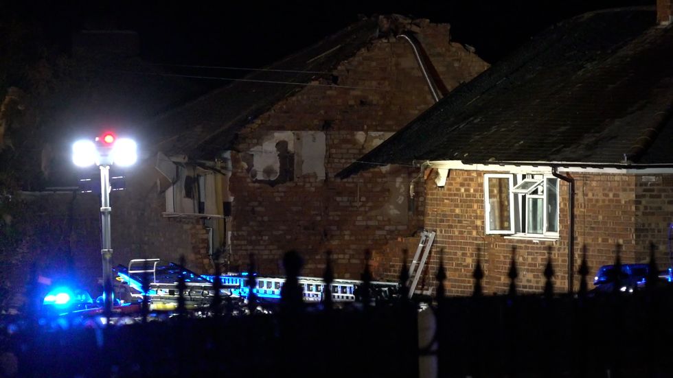 Emergency services at the scene in Dulwich Road, Kingstanding, where a property has been destroyed in an explosion