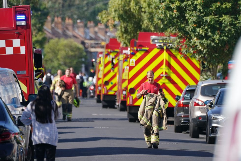 Emergency services at the scene in Galpin's Road in Thornton Heath, south London, where the London Fire Brigade (LFB) report that a house has collapsed amid a fire and explosion. Picture date: Monday August 8, 2022.