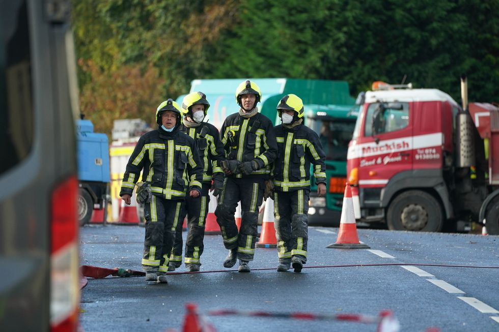 Emergency services continue their work at the scene of an explosion at Applegreen service station in the village of Creeslough in Co Donegal, where nine people have now been confirmed dead. Picture date: Saturday October 8, 2022.