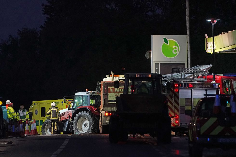 Emergency services continue their work at the scene of an explosion at Applegreen service station in the village of Creeslough in Co Donegal, where at least three people have died. Picture date: Saturday October 8, 2022.