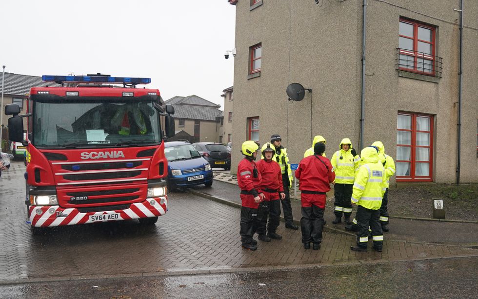 Emergency services go door to door speaking with residents in Inverurie, Aberdeenshire as Storm Babet batters the country and a rare red weather warning is in place for parts of eastern Scotland all day on Saturday.