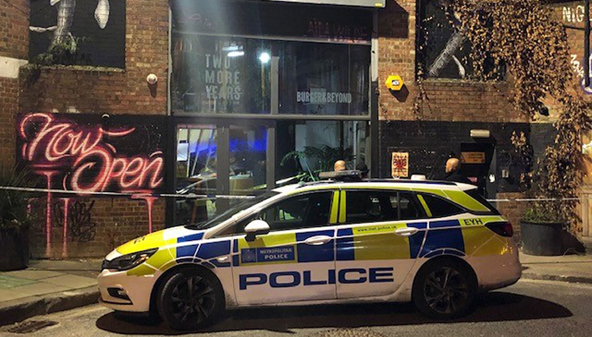 Emergency services outside the Two More Years bar and restaurant studios at Fish Island, Hackney Wick, east London, after a number of people were injured when a mezzanine floor at the venue collapsed. Picture date: Saturday February 12, 2022.