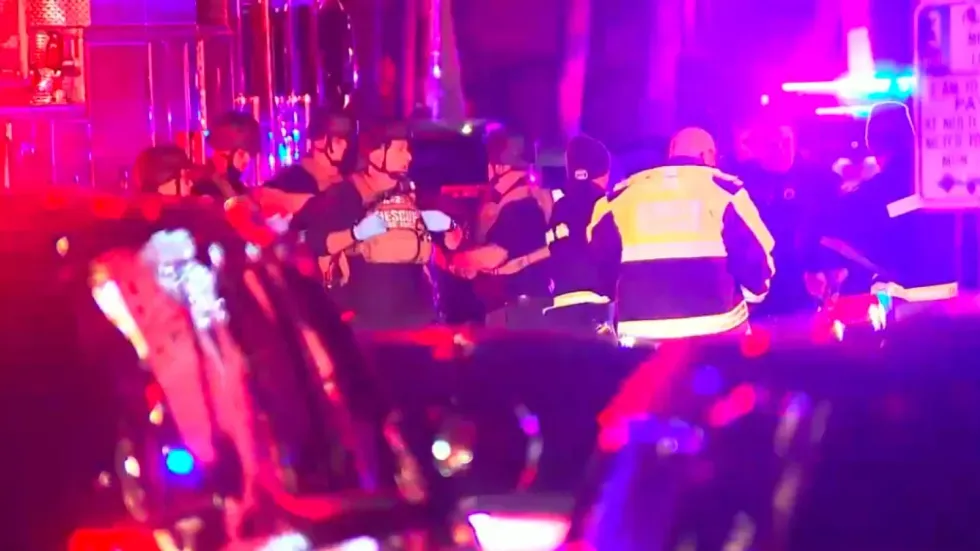 Emergency services swarm the scene at Brown University as shots rang out