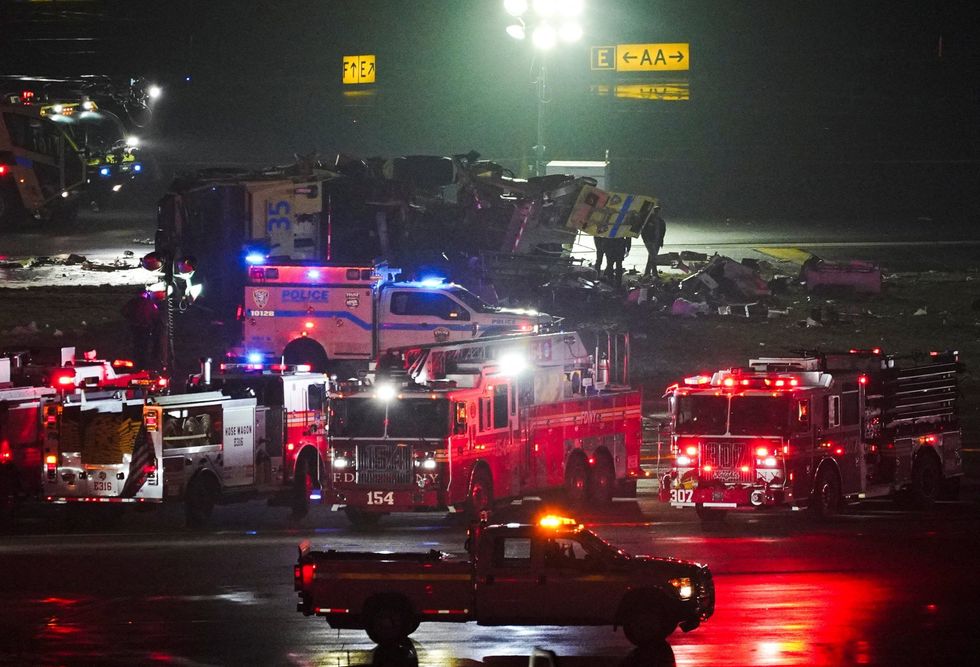 Emergency vehicles surround firetruck LaGuardia, New York