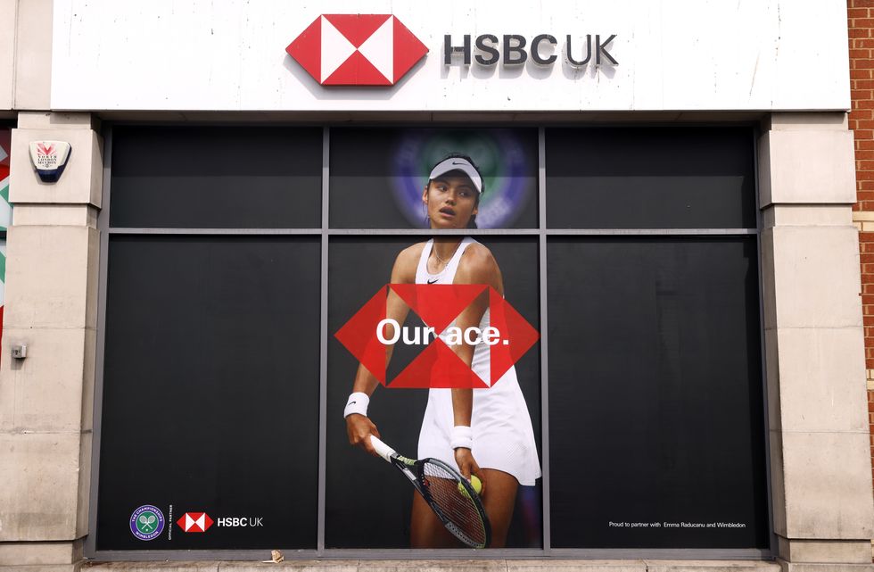 Emma Raducanu features on HSBC advertising outside their branch in Wimbledon ahead of the 2022 Wimbledon Championship at the All England Lawn Tennis and Croquet Club, Wimbledon. Picture date: Thursday June 23, 2022.