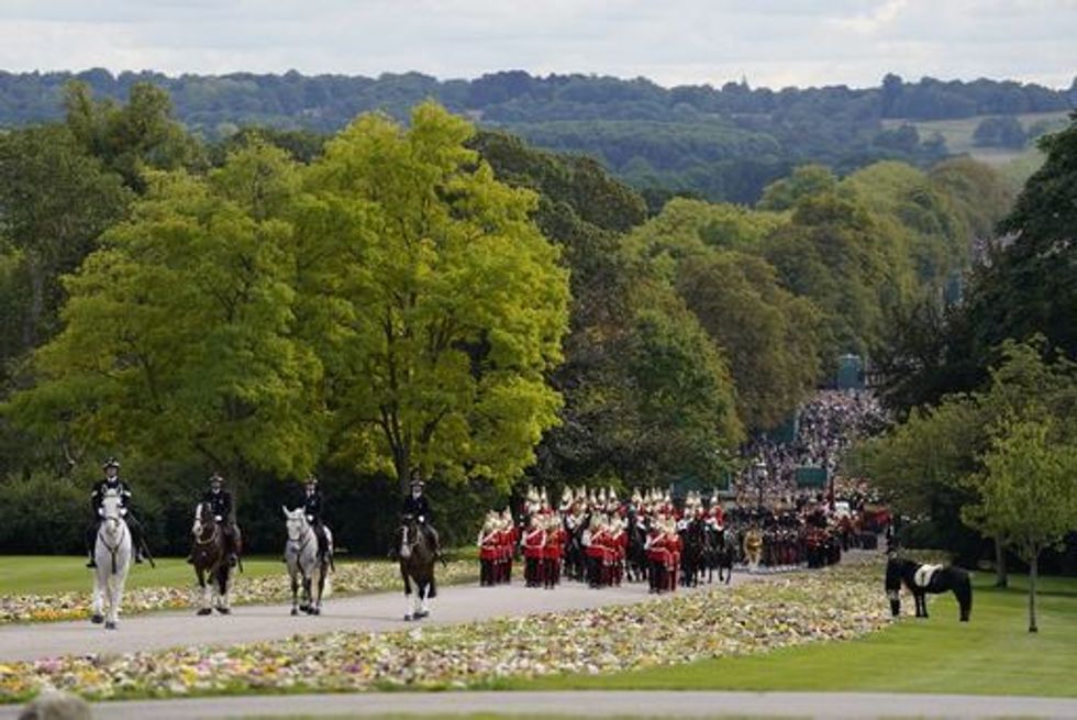 Emma, the monarch's fell pony, stands as the Ceremonial Procession of the coffin of Queen Elizabeth II arrives at Windsor Castle for the Committal Service at St George's Chapel. Picture date: Monday September 19, 2022.