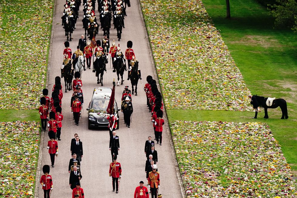 Emma, the monarch's fell pony, stands as the Ceremonial Procession of the coffin of Queen Elizabeth II arrives at Windsor Castle for the Committal Service at St George's Chapel. Picture date: Monday September 19, 2022.
