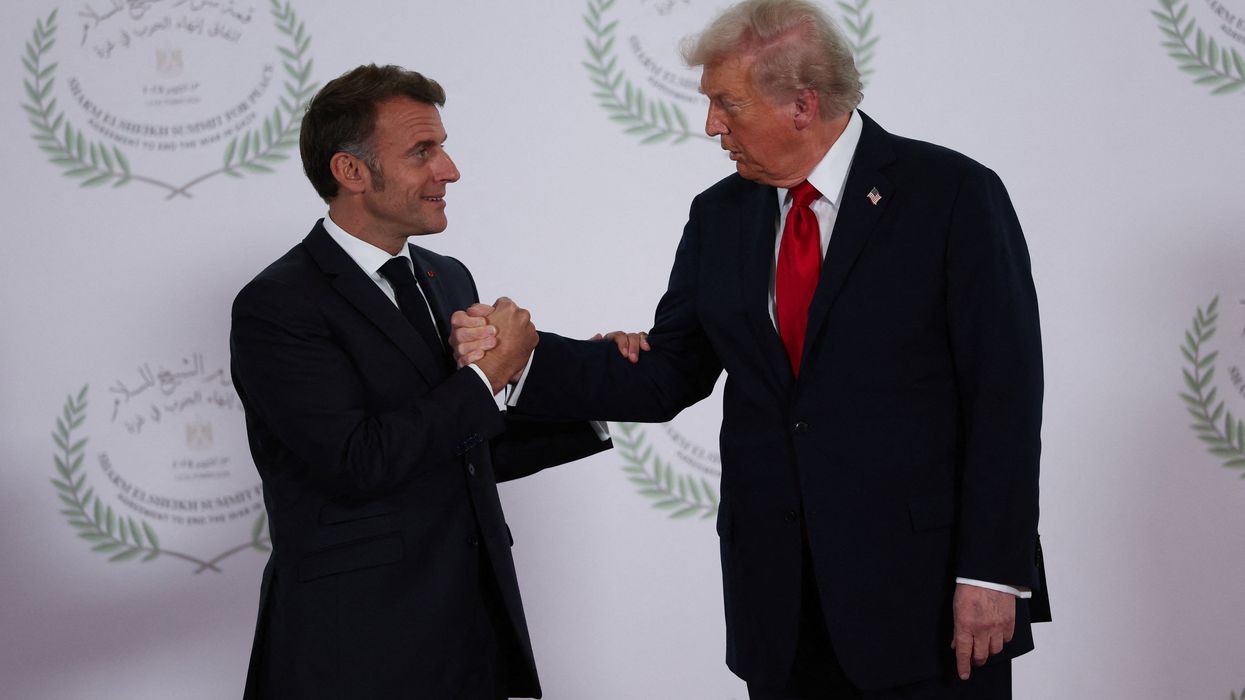 Emmanuel Macron and Donald Trump shaking hands in Egypt