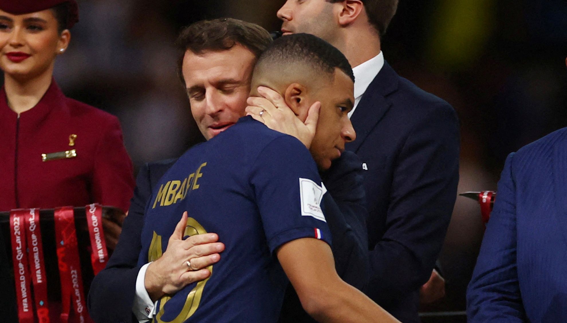 Emmanuel Macron comforts Kylian Mbappe after their country missed out on World Cup glory.