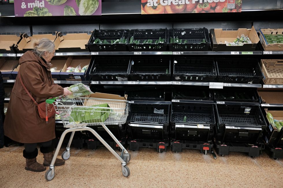 Empty fruit and vegetable shelves at an Asda in east London. A shortage of tomatoes affecting UK supermarkets is widening to other fruit and vegetables and is likely to last weeks, retailers have warned. A combination of bad weather and transport problems in Africa and Europe has seen UK supermarket shelves left bare of tomatoes, as well as dwindling stocks of some other fresh produce. Picture date: Tuesday February 21, 2023.