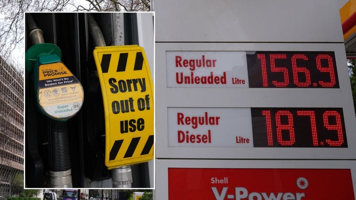 Empty fuel pump and petrol and diesel prices at a filling station