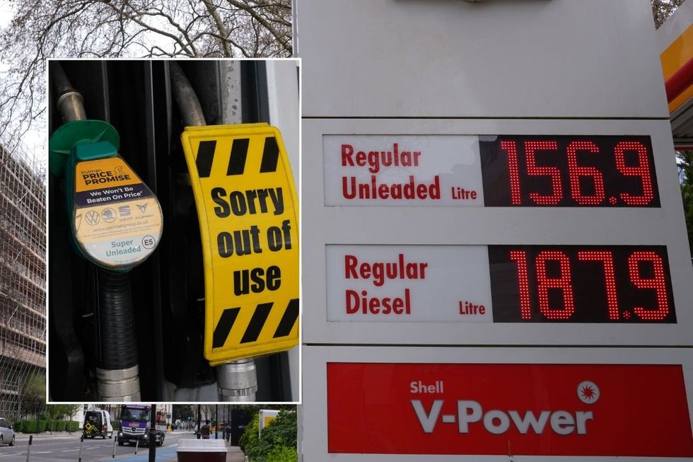 Empty fuel pump and petrol and diesel prices at a filling station