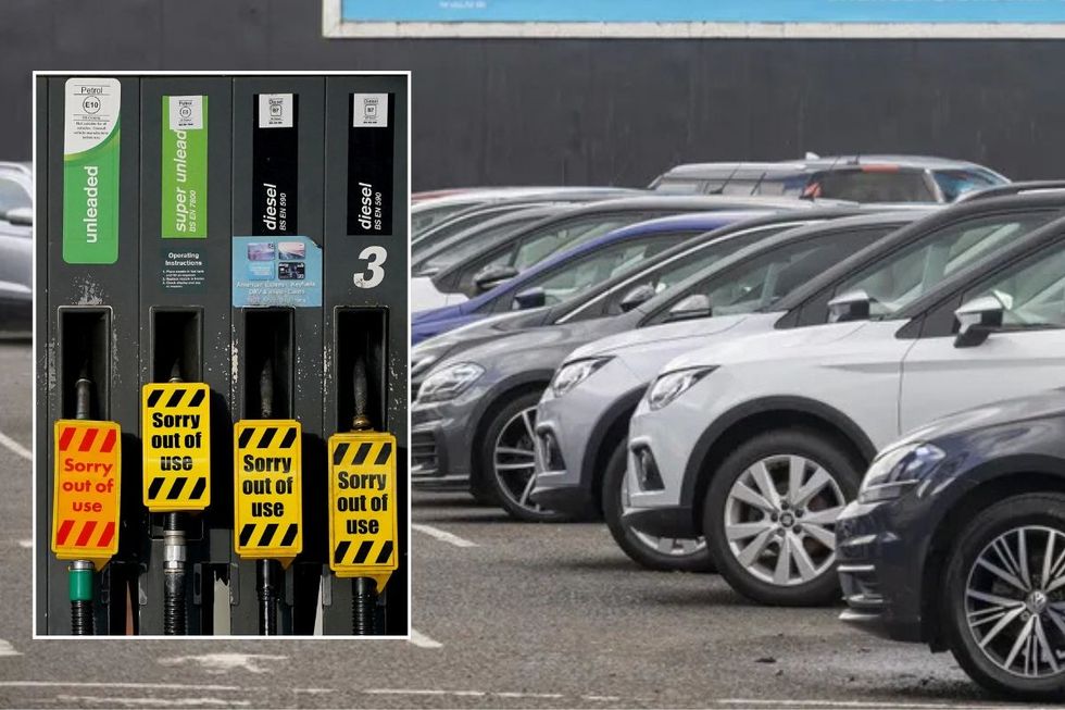 Empty petrol and diesel pumps and a used car forecourt