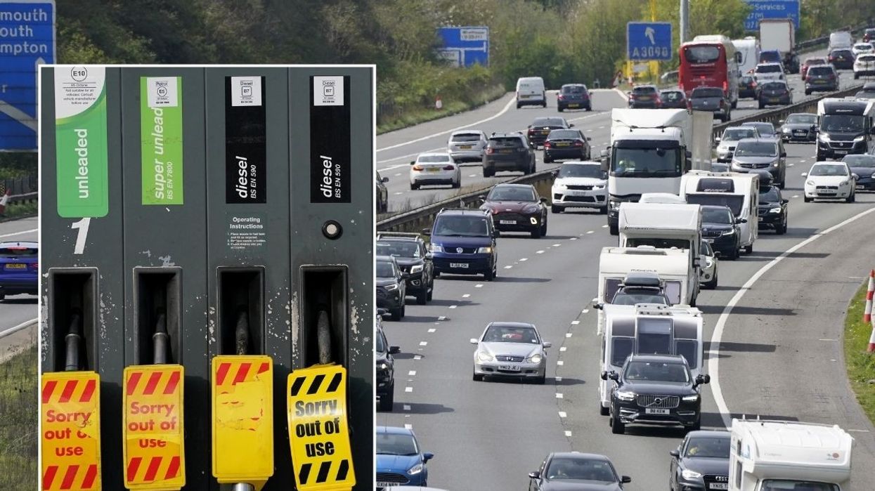 Empty petrol pump and a busy road