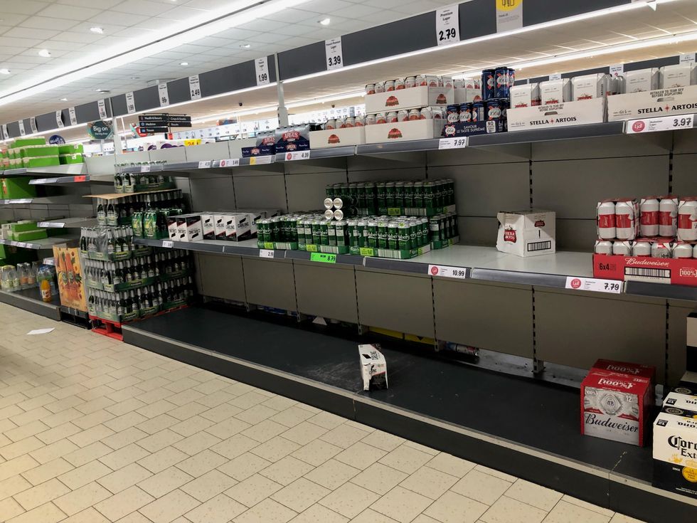 Empty shelves in the Lidl at Pity Me, Durham. Supermarkets have urged customers not to panic buy in response to reports of emptying shelves, saying they are continuing to receive regular deliveries. The UK's biggest supermarkets described any shortages as %22patchy%22 across stores but said there was no need for customers to change their shopping habits. Picture date: Thursday July 22, 2021.