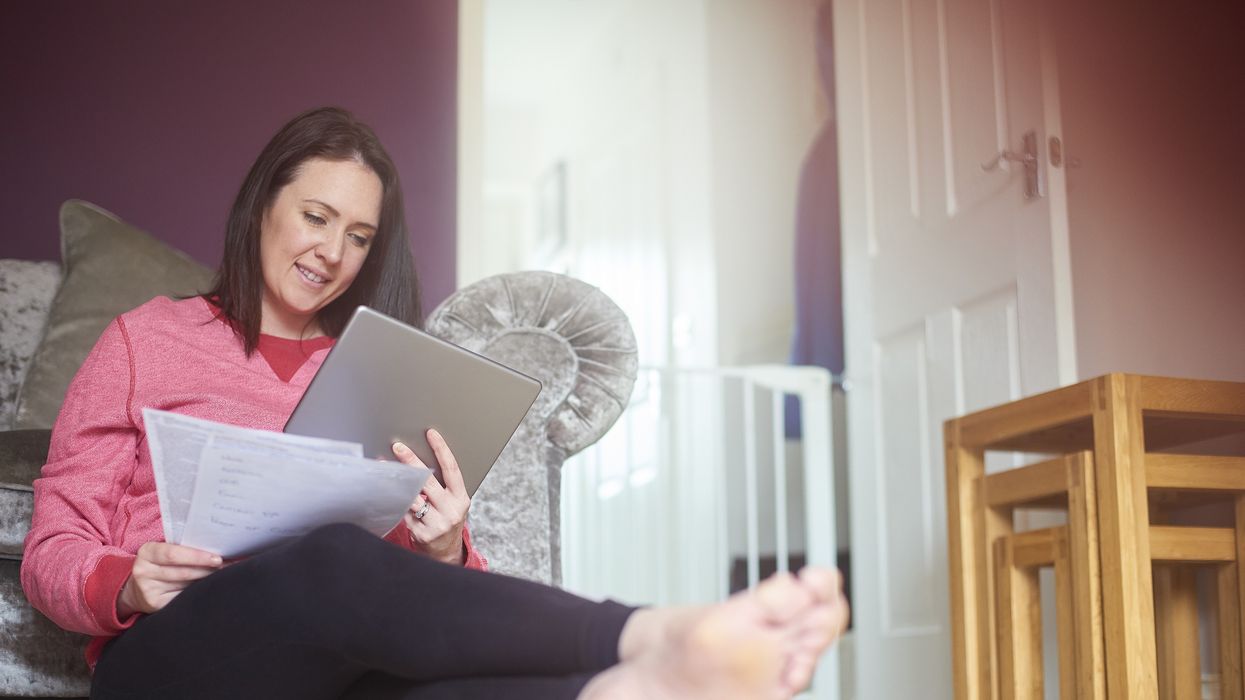 Energy bills customer looks at letter