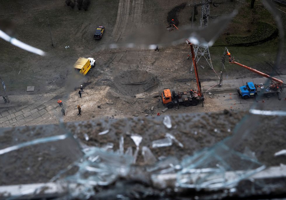 Energy supply workers restore a high-voltage line destroyed in Russian missile attack