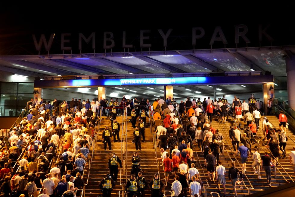 England fans outside Wembley Park station after the UEFA Euro 2020 Final.