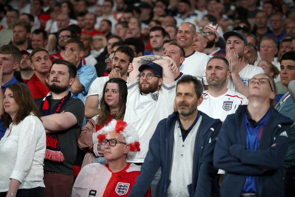 England fans react in the stands during the UEFA Euro 2020 Final at Wembley Stadium, London.