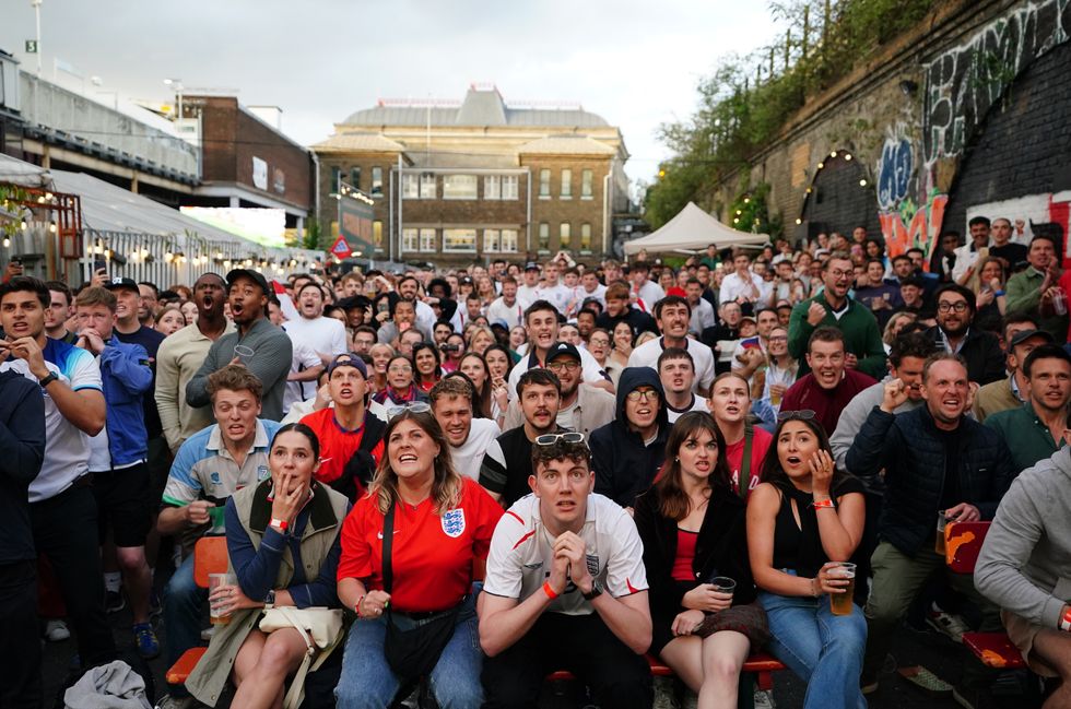England fans watch in anticipation of Kane's penalty
